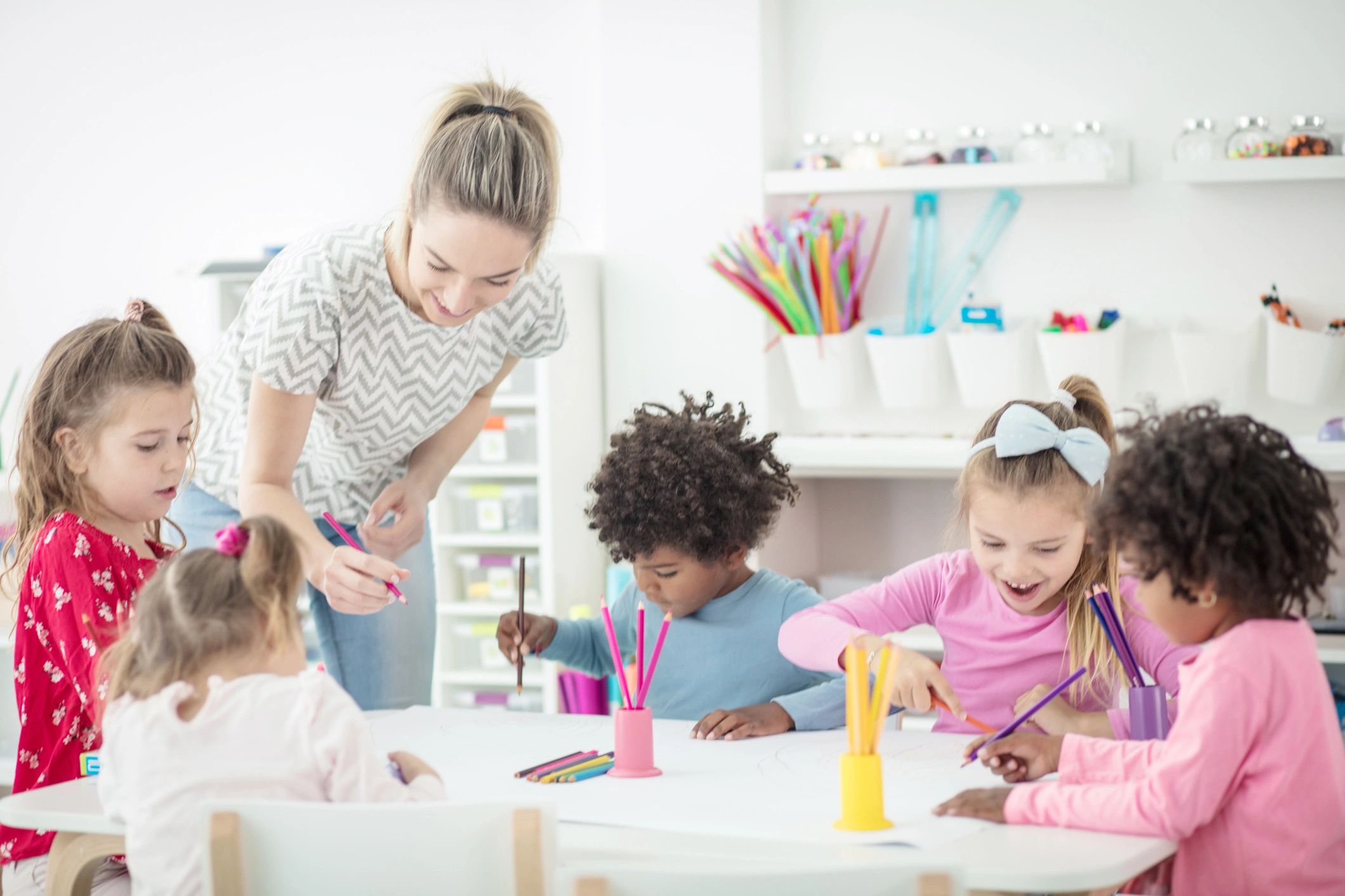 Children creating art together in a classroom