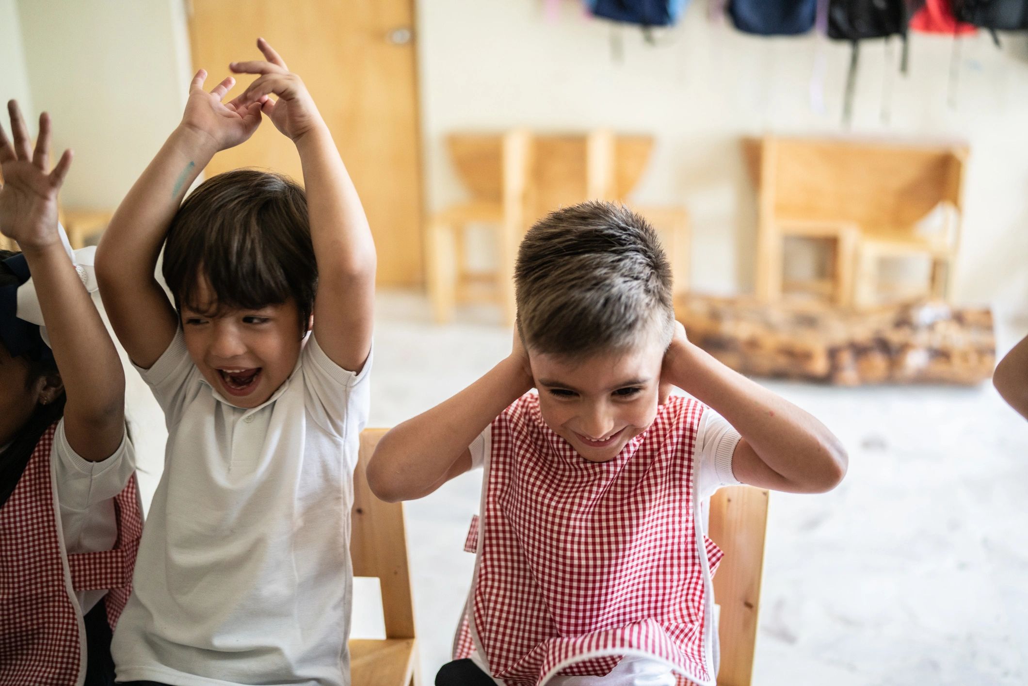 Children celebrating together in a classroom
